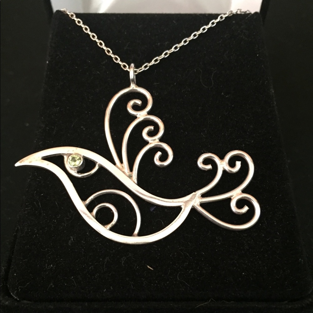 Beautiful Sterling silver bird necklace .